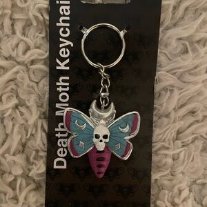 Spencer's Blue and Pink Death Moth Keychain